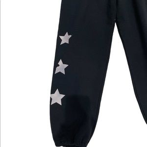 Black distressed star joggers